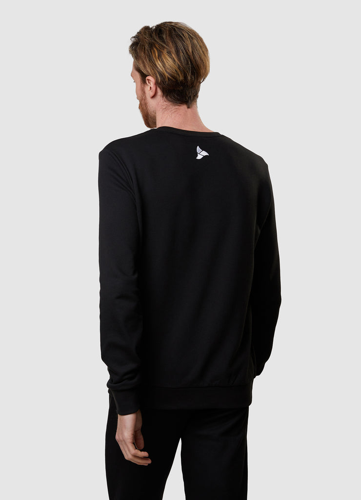 Man wearing TRI-FIT Casualwear black sweatshirt