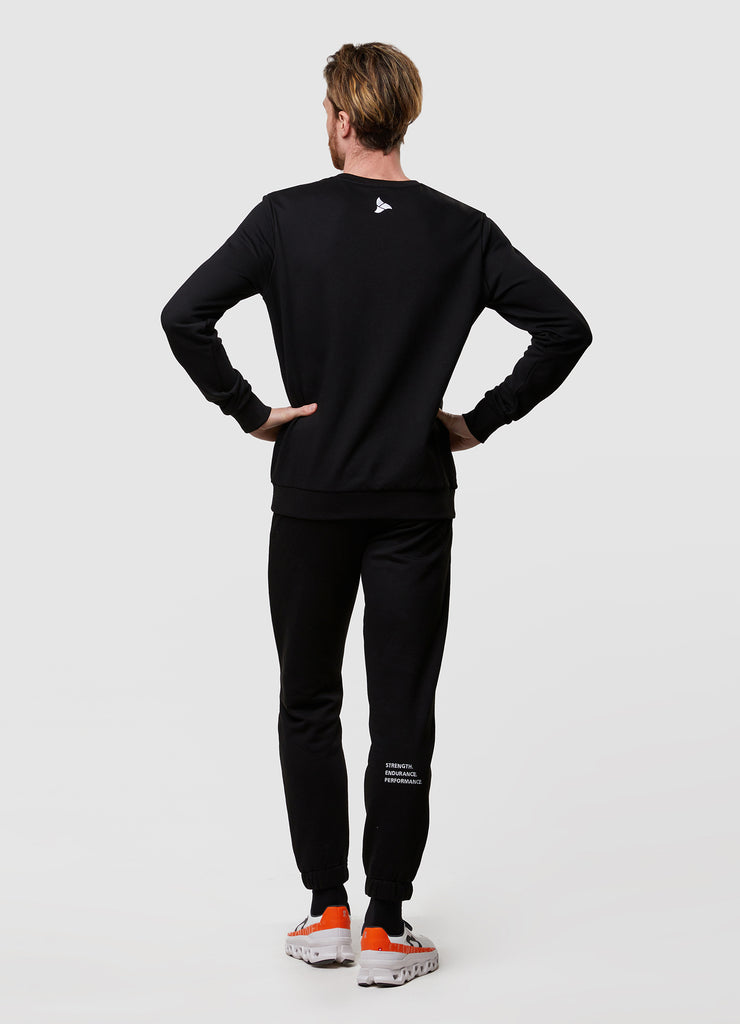 Man wearing TRI-FIT Casualwear black sweatshirt