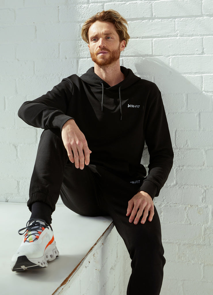 Man wearing TRI-FIT Casualwear black hoodie