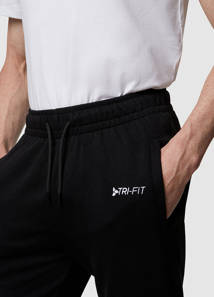 Man wearing TRI-FIT Casualwear black joggers