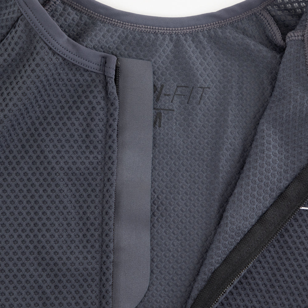 Close-up of internal neckline construction on men’s VANGUARD tri-suit in grey, showing breathable mesh and clean finish