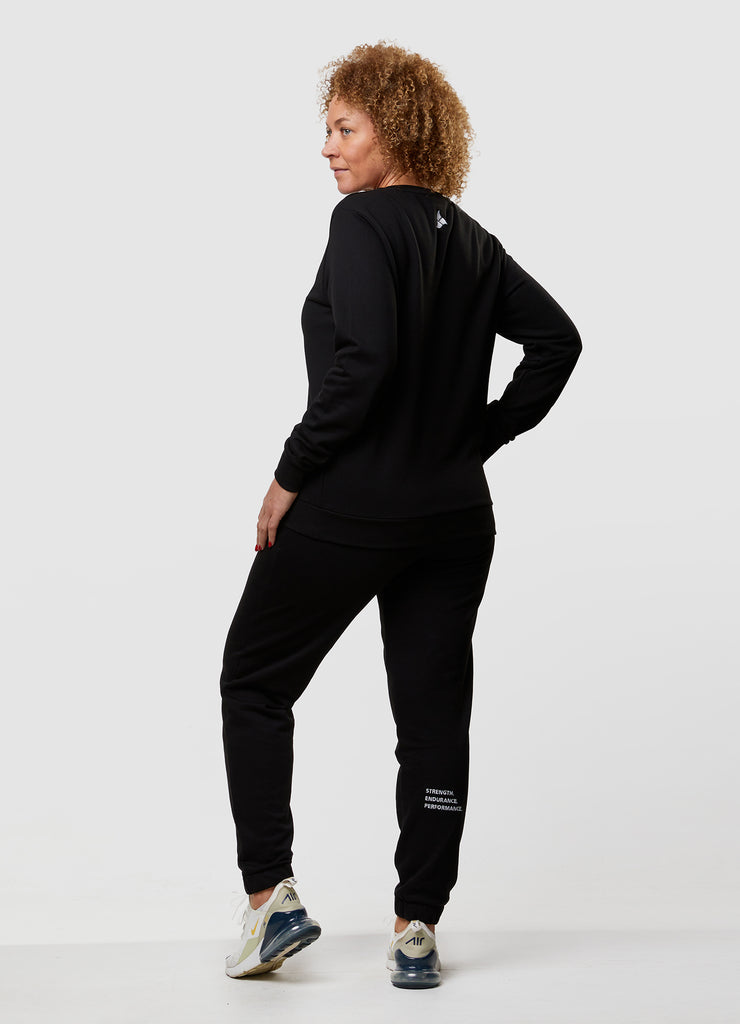 Woman wearing TRI-FIT Casualwear black sweatshirt