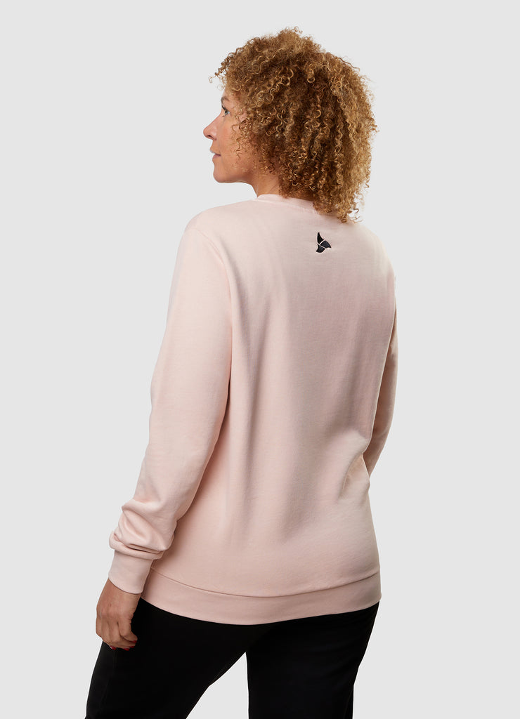 Woman wearing TRI-FIT Casualwear dusty pink sweatshirt