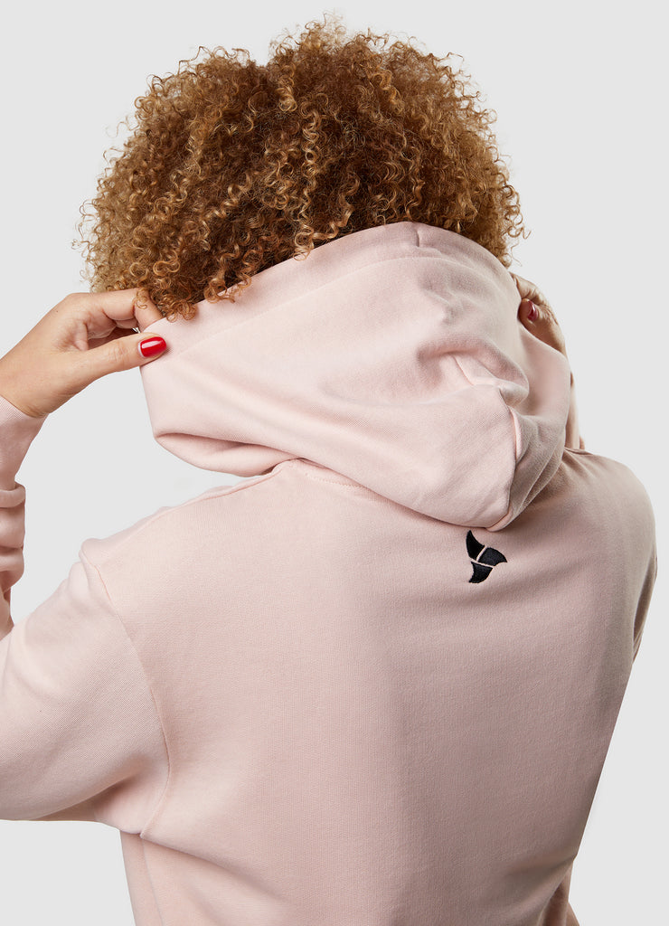 Woman wearing TRI-FIT Casualwear dusty pink hoodie