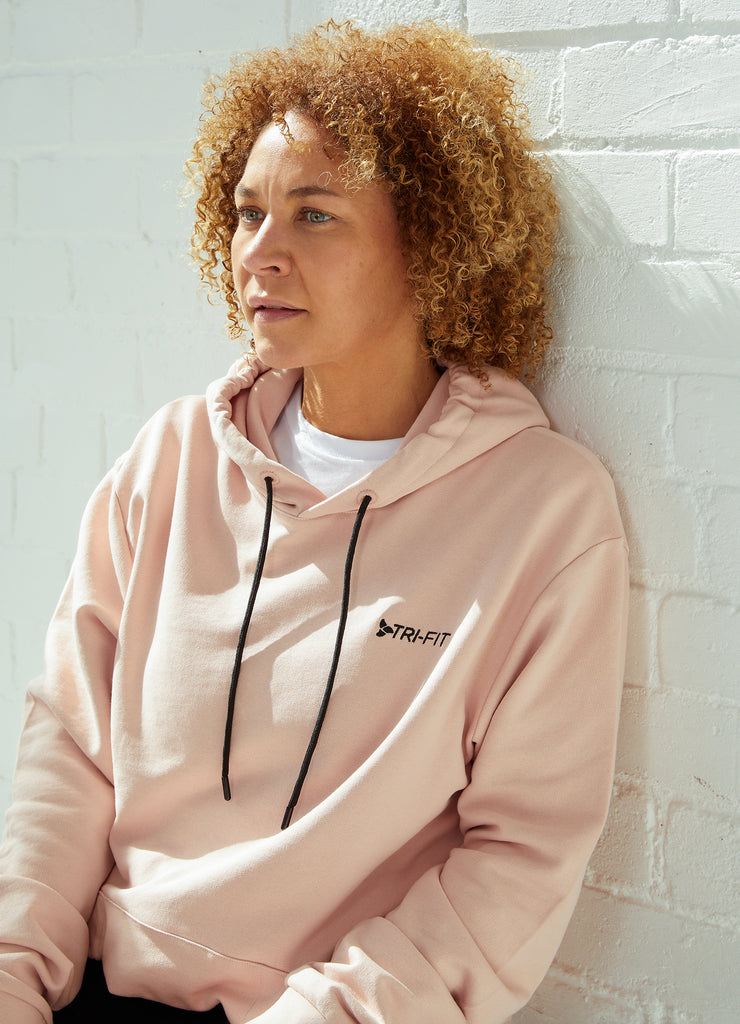 Woman wearing TRI-FIT Casualwear dusty pink hoodie