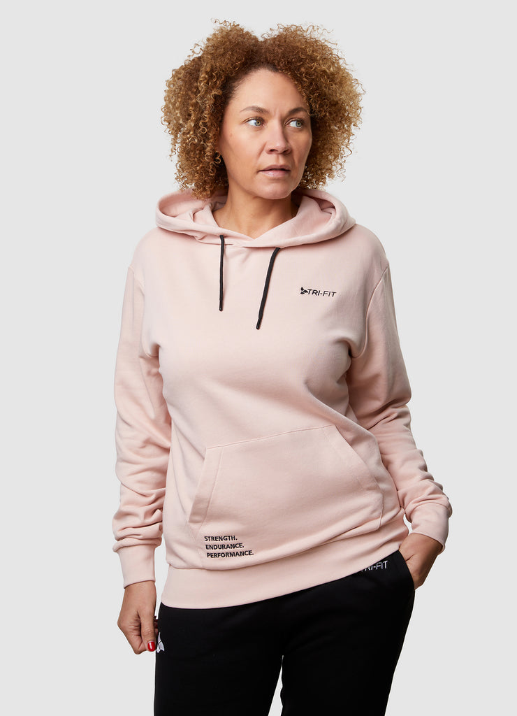 Woman wearing TRI-FIT Casualwear dusty pink hoodie