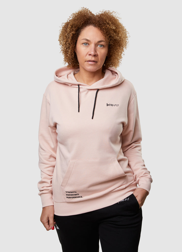 Woman wearing TRI-FIT Casualwear dusty pink hoodie