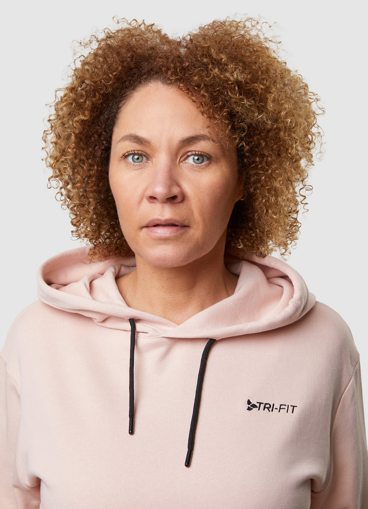 Woman wearing TRI-FIT Casualwear dusty pink hoodie